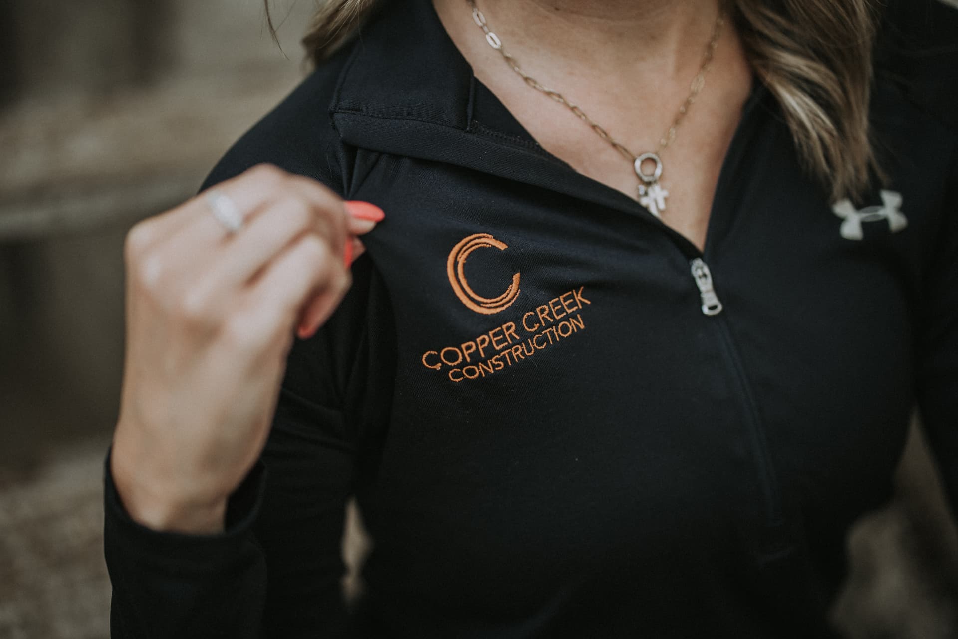 Copper Creek Construction embroidered logo apparel